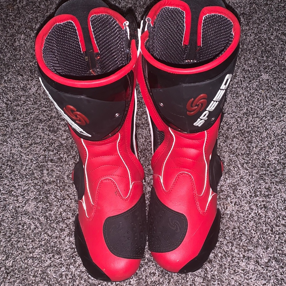 Bike shoes color is red and black size is 10 in men